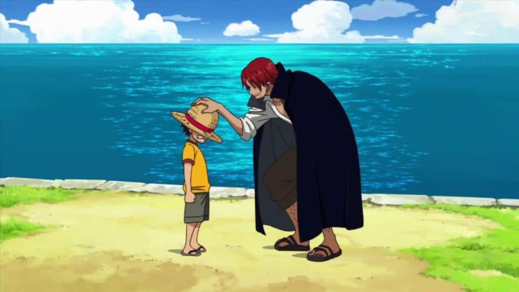 Shanks el Roux y Monkey D. Luffy de niño en One Piece