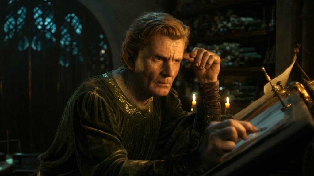 Celebrimbor pensativo frente a unos bocetos en su taller de Eregion